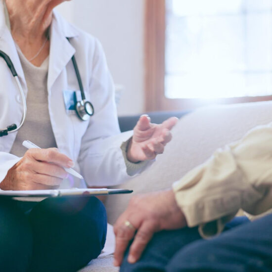Physician in consultation with a patient