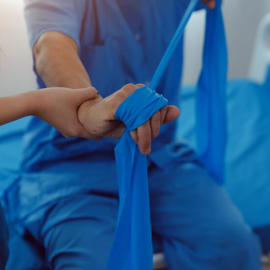 Therapist guiding a patient through balance and core training